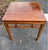 A beautifully crafted Chinese elm square table in the classical Ming style, dating to the early 20th century. This elegant...