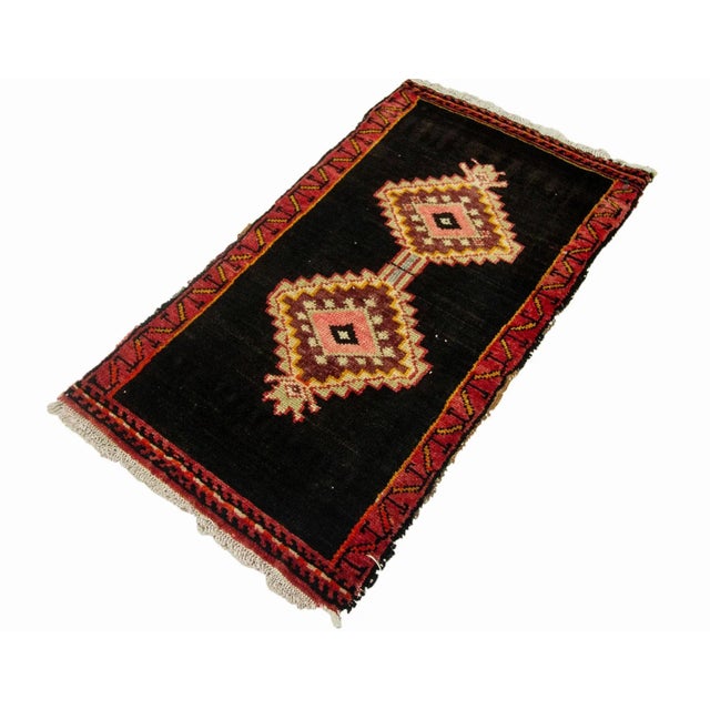 Vintage Handknotted decorative mini rug from Kars region of Turkey. Approximately 45-55 years old. In very good condition.