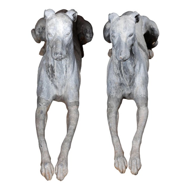 Life-Sized, Early 1900s, Recumbent Hounds - A Pair For Sale
