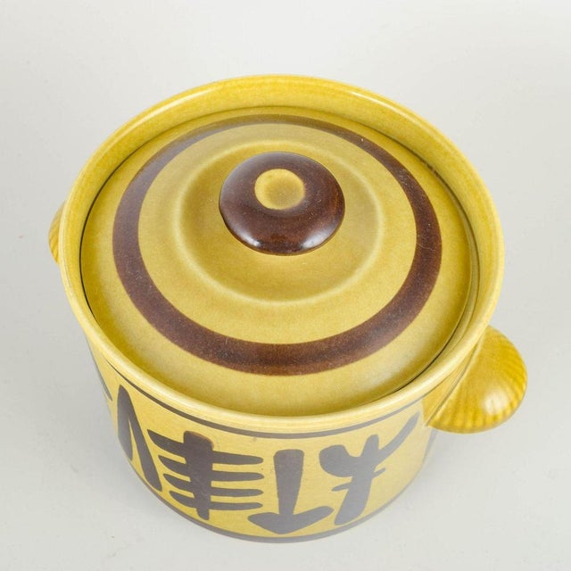 Upsala-Ekeby / Gefle Lidded tureen “Pang”, 1960s. Retro lidded tureen in glazed faience with hand-painted decoration in...