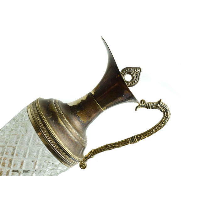 Exuding Victorian opulence and Italian craftsmanship, this vintage wine decanter or claret jug is a testament to elegance...