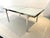 Chrome-plated steel, expandable table by Pierre Cardin for Dillingham Furniture Co. with three new, mirrored glass tops....
