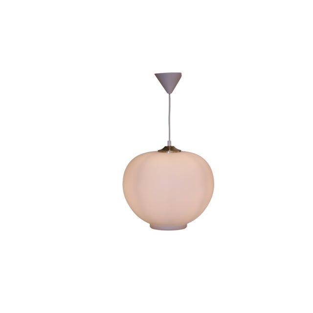 Danish ceiling lamp in a lovely larger size that really takes over the room and creates an impressive atmosphere, while...