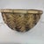 Handcrafted vintage bamboo winnowing basket features a deep round silhouette with a traditional diagonal weave pattern....