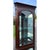 Classic cherry corner display cabinet by Ethan Allen from their iconic Georgian Court Collection. The top door has a...