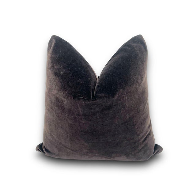 This handmade 21" x 21" decorative pillow cover is crafted from rich chocolate brown velvet, offering a luxurious texture...
