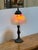 Design Plus Gallery presents a Boudoir Table Lamp of the Victorian Era or Style. The lamp has a molded metal body with...