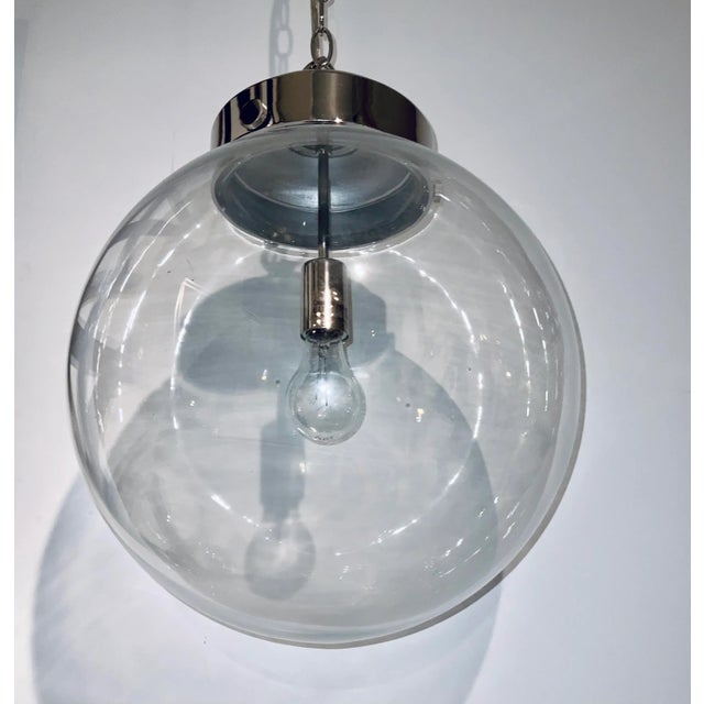 Original retail $1230, stylish Modern Glass and Nickel Bulbous Reeves Pendant Light, showroom floor sample