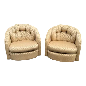 Pair of Champagne Colored Swivel Chairs