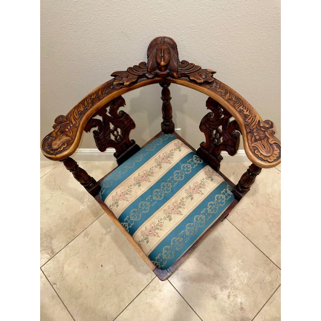 Renaissance Style Walnut Corner Chair. Around late 20th century, well carved with woman's head on crest, dragons on back...