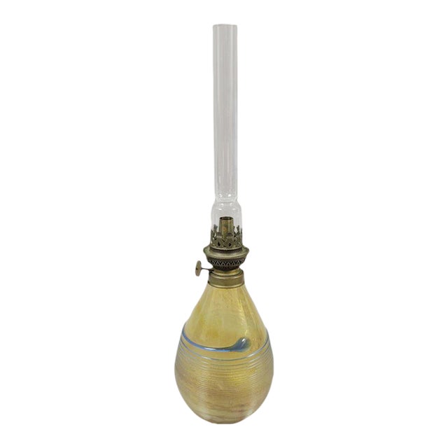 Iridescent Amber Blown Art Glass Oil Lamp With Blue Threading For Sale