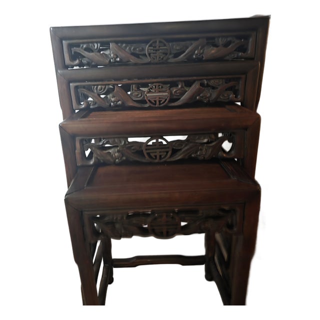 Set of 1930s Chinese Carved Hardwood Nesting Tables With Traditional Fretwork and Longevity Symbols For Sale