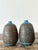 This exceptional pair of vintage studio pottery vases captures the raw, expressive spirit of the Brutalist and Mid-Century...