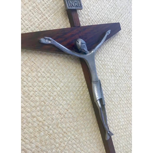 This is a modernist crucifix that is constructed in wood and metal, very good condition.