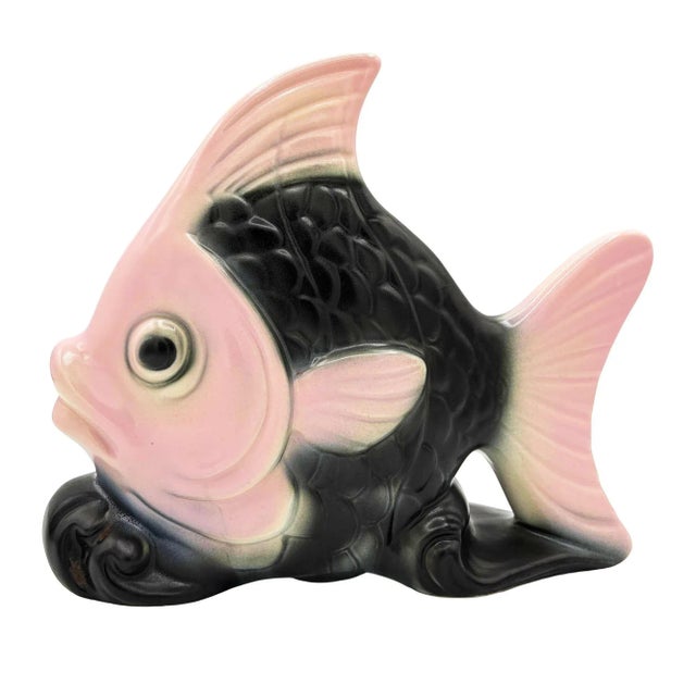 Mid-century Pink & Black Ceramic angel fish wall pocket planter made in California. The wall planter features a detailed...
