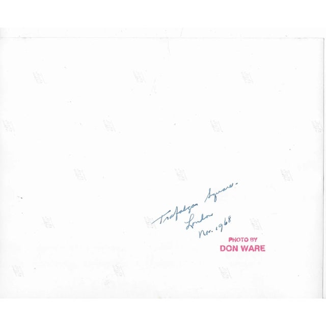 1968 black and white photograph by Los Angeles, California based photographer Don Ware of Trafalgar Square filled with...