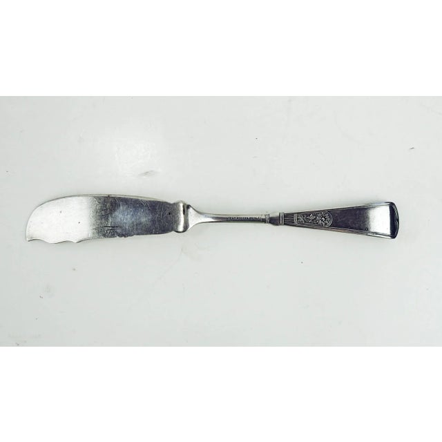 Silverplate aesthetic movement Rogers master butter knife. Nevada pattern with grapes, marked 1847 Rogers Bros. on back....