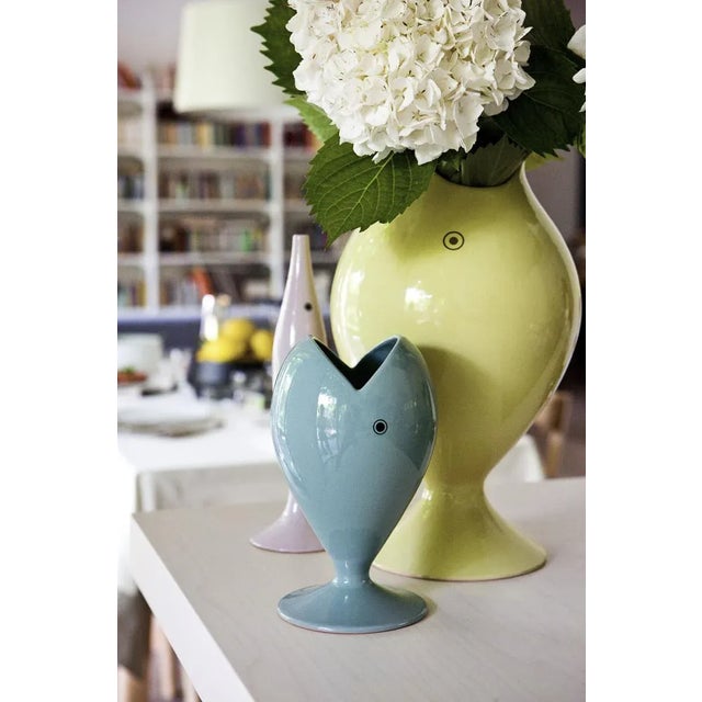 This hand-thrown, yellow ceramic vase was designed by Giulio Iacchetti in 2015 and is produced by Giuseppe Mazzotti 1903....