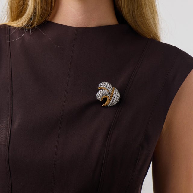 This exceptional Van Cleef & Arpels brooch is a remarkable Mid Century jewel from the 1960’s, set with 127 round brilliant...