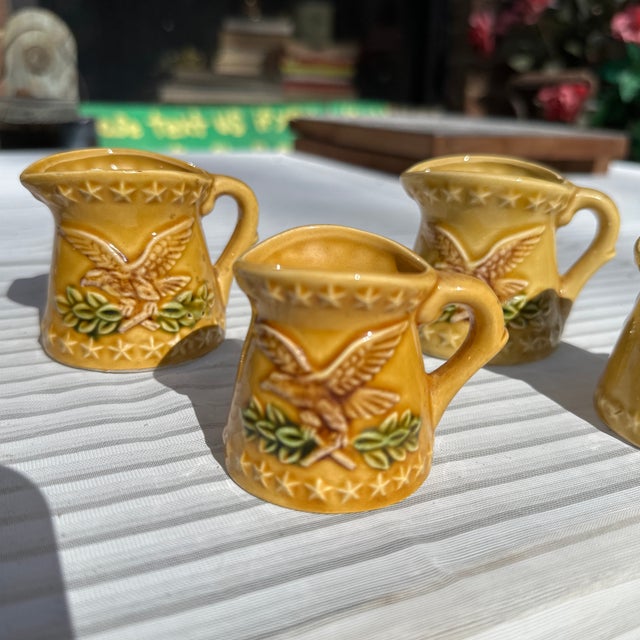 Yellow 1970s Collection of Yellow Ceramic Measuring Cups With Eagle Accents- Set of 6 For Sale - Image 8 of 11