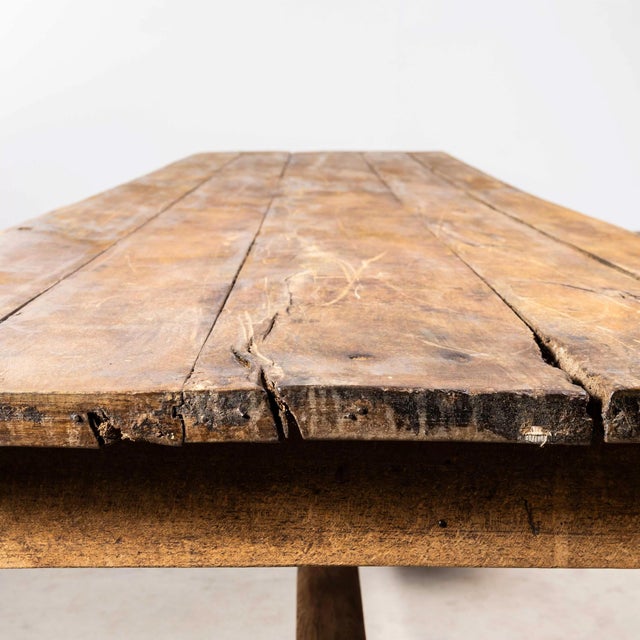1940's planked very large poplar french farmhouse table - 3.7m. Sourced in the aquitaine region of western france, this is...