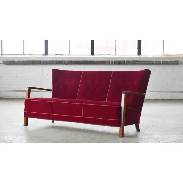 Superb Danish late Art Deco early midcentury sofa from the late 1930's or early 1940s with spring cushions and beautiful...