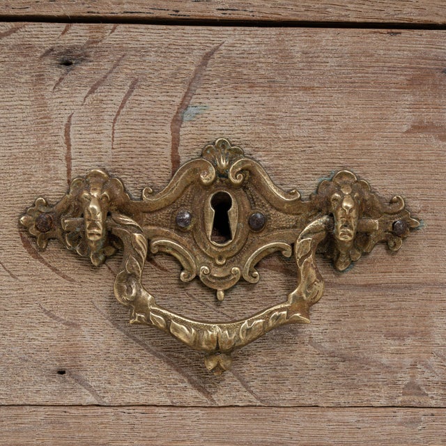 This 1900s French Louis XVI chest of drawers showcases classic neoclassical symmetry and understated refinement. Crafted...