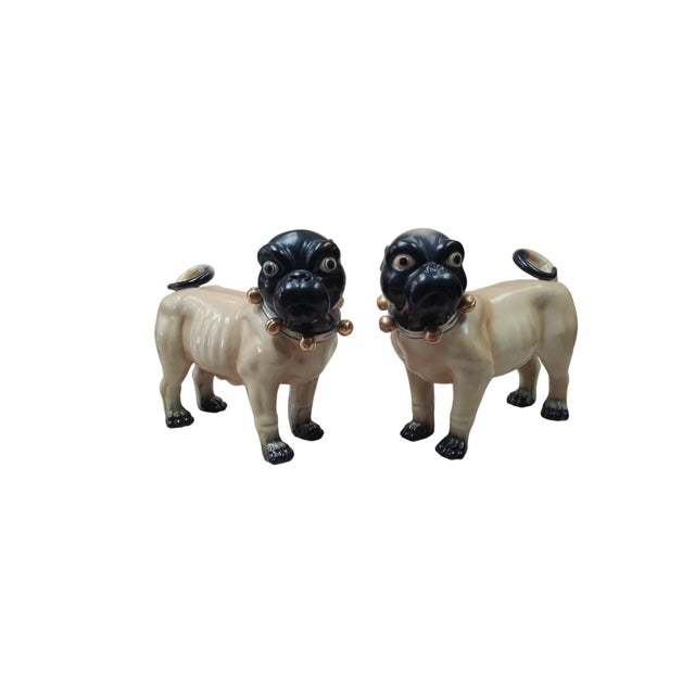 This pair of pugs is made of painted terracotta in Italy in the 1950s. Modeled with wide, expressive eyes and a compact...