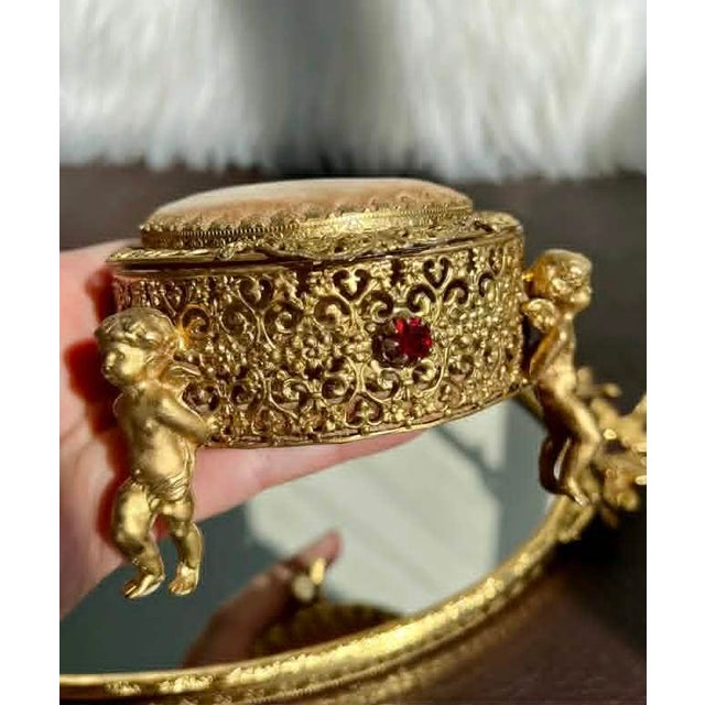 Hollywood Regency Three Footed Cherub Round StyleBuilt Style Vintage Design Jewelry Casket/ Box With Pink Plush on the Top and Inside & Burgundy Red Stones Decoration For Sale - Image 4 of 11