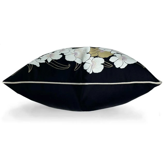 A cascade of orchids brings a delightfully tropical touch to any space 22" pillow, upholstery cotton twill with supersoft...