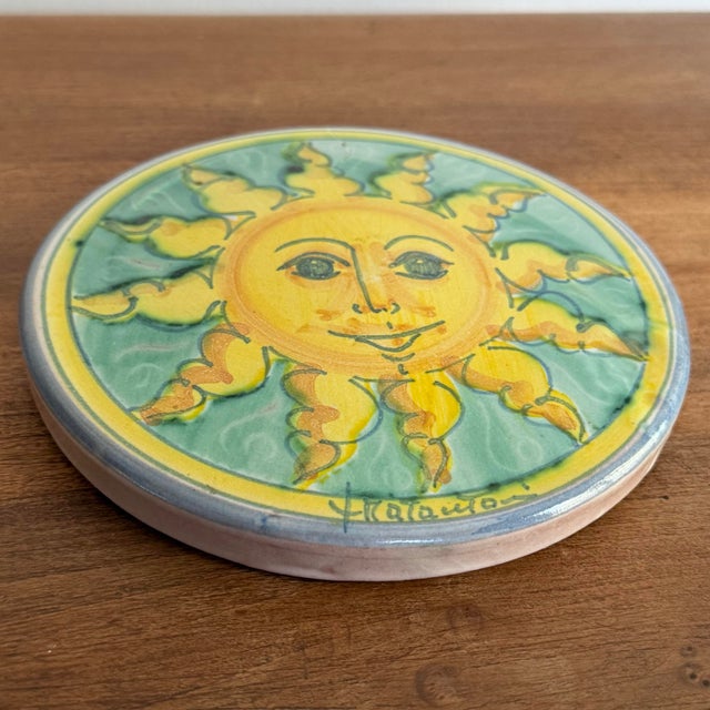 Add some Italian sunshine with this pretty pottery plaque. Back is labeled Fratantoni for Vietri, Italy. Most items found...