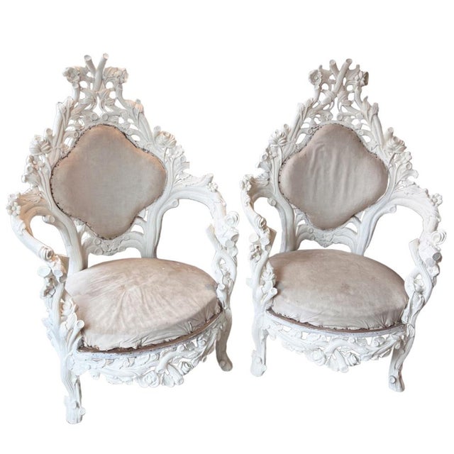 Highly decorative - this pair of naturalistic Italian carved wood armchairs certainly make a statement. Please take a look...