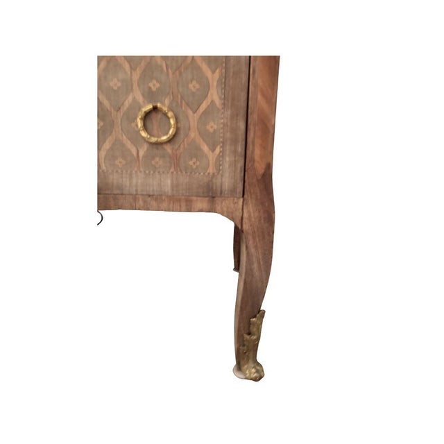 A rare gem, this bleached oak chest features marquetry detail and ormolu mounts with a sturdy marble top. 19th Century....