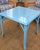 A vibrant and versatile game table, meticulously refinished in a custom high-gloss blue lacquer. This vintage rattan table...