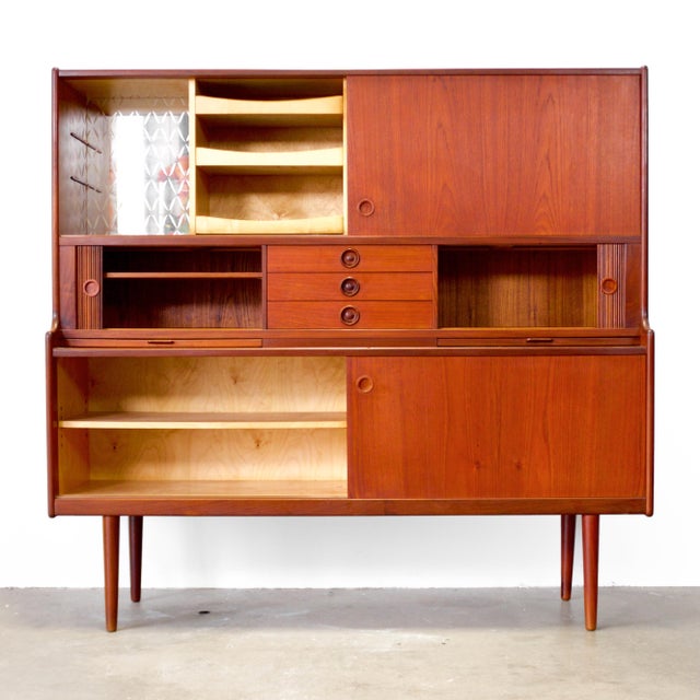 Dimensions: 63" L x 14" - 17 1/4" D x 59 5/8" H Origin: Denmark Designer: Johannes Andersen Manufacturer: J. Skaaning &...
