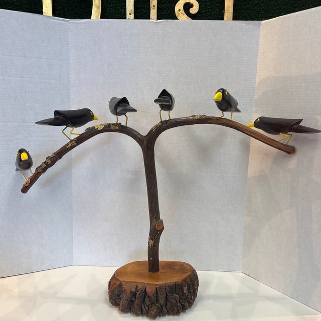 Carved blackbirds by artist couple Lonnie & Twyla Money. Piece has 6 hand carved blackbirds mounted on a branch which is...