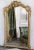 Large and impressive 19th century French Baroque style beveled mirror with an elaborately hand-carved gilt frame. Very...