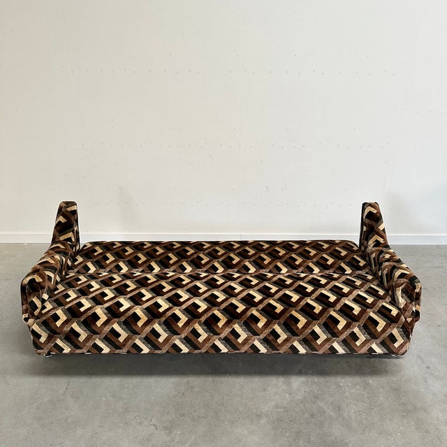 Vintage sofa from the 1960s/70s with a fantastic geometric pattern. It can be easily folded out into a bed (95x210cm) and...