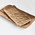 Modern, rectangle forms and rounded edges make this pair of cast aluminum trays unique. Line with a collection of candles,...