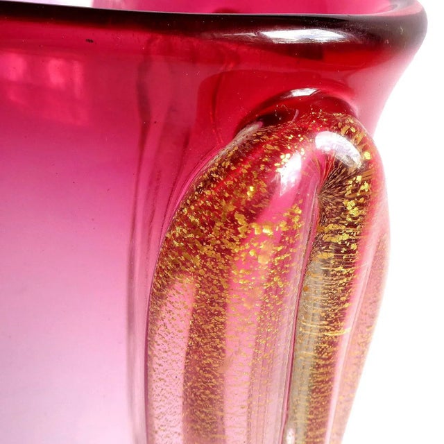 Gorgeous vintage Murano hand blown Sommerso red to pink, and gold flecks Italian art glass flower vase. Attributed to...