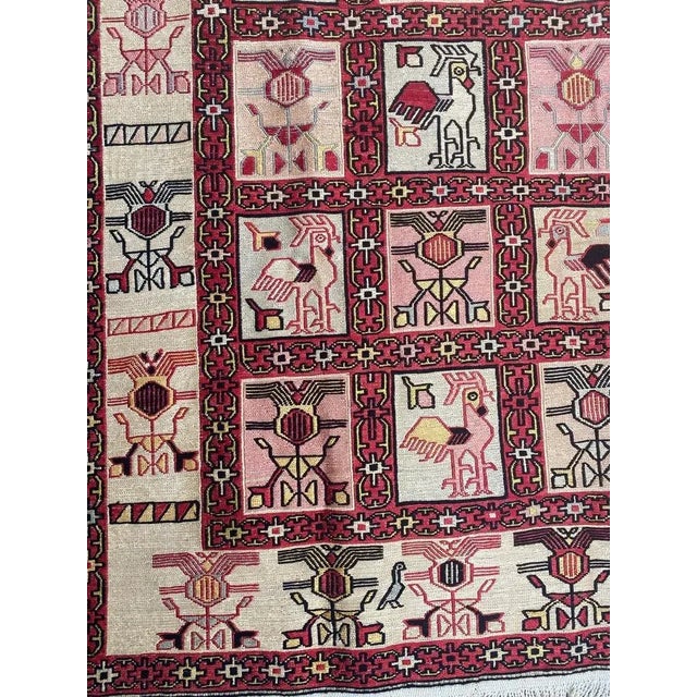 Pretty verneh silk Kilim with a geometric stylized design and beautiful colors with red, pink and beige, entirely hand...