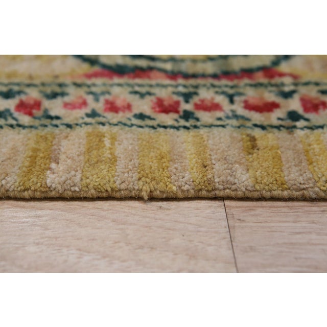 Iris Cozy Beige Hand Knotted Wool Rug, Country of Origin: China. This exquisite piece, rooted in the rich Chinese weaving...