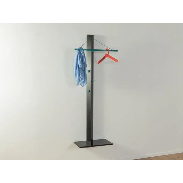 Postmodern wardrobe by Schönbuch from the 1980s. Frame and shelf made of black painted wood, hanging rail made of painted...