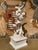 This compelling italian 19th century white glazed porcelain sculpture depicts ‘the rape of the sabines’, after a...