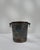 A 20th century French champagne bucket crafted in metal with a silver-plated finish, featuring a cylindrical form with...