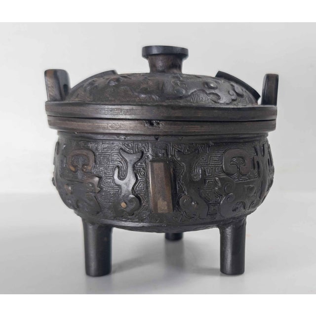 We are selling this great Chinese cast iron censer. This unusual censer is cast in Iron and appears to be inlaid with...