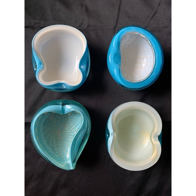 This is a vintage curated collection of Murano art glass bowls in shades of blue and turquoise. Each bowl is a pristine...