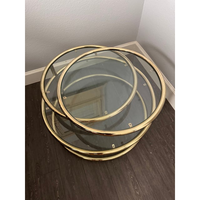 Attributed to Morex Furniture (Italy), Glass and tubular gold metal coffee or cocktail table. Iconic, and versatile, 20th...