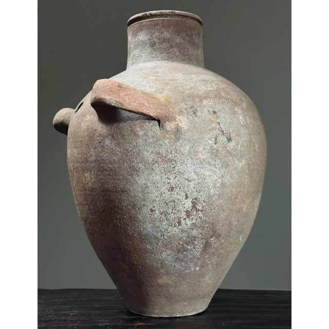Large Antique Patinated Terracotta Olive Jar. Double handled olive jar. In used condition with wear consistent with age....