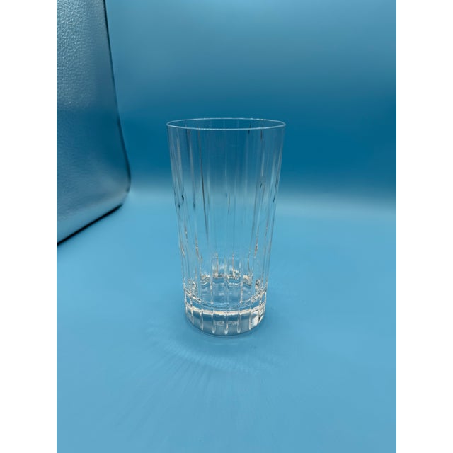 The Baccarat Harmonie Highball is a luxury crystal glass known for its trim, linear silhouette and distinctive vertical...